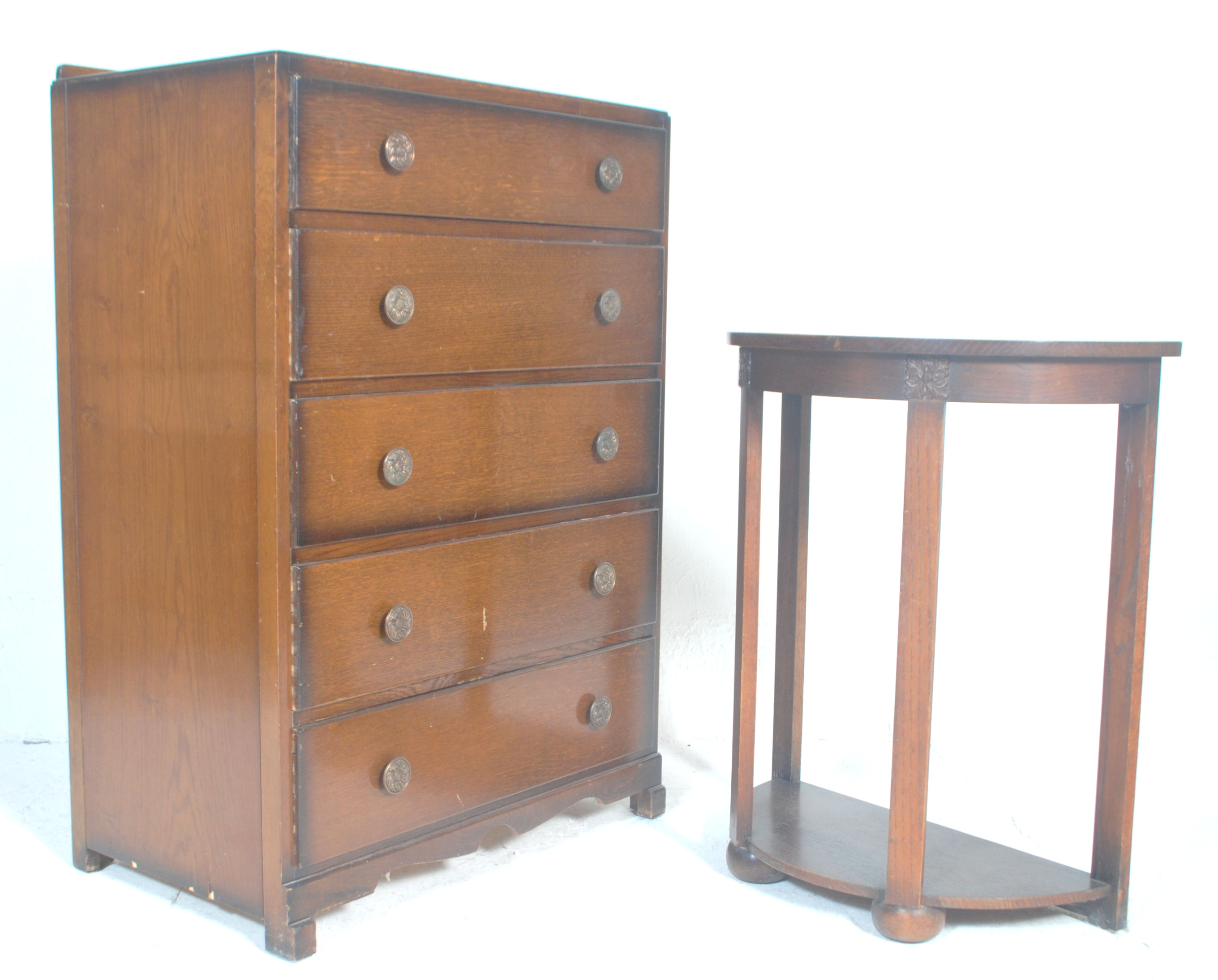 A 1930s art deco vintage oak panel chest of drawers having a gallery back...