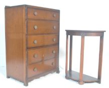 A 1930s art deco vintage oak panel chest of drawers having a gallery back over five graduating