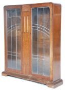 An 1930's Art Deco Oak China Display Cabinet vitrine with twin leaded astragal glazed double doors