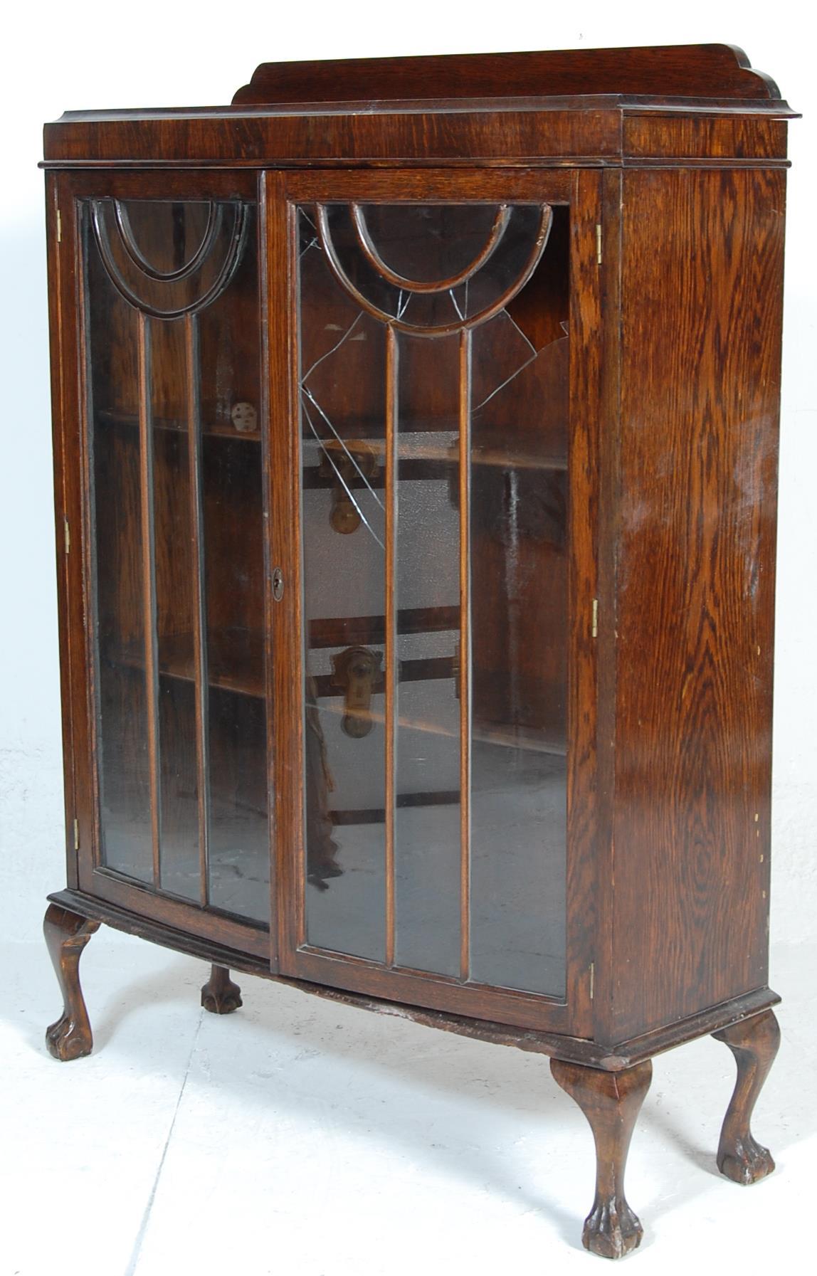 A 1930's Art Deco oak bow front library  bookcase cabinet. The cabinet having a raised back over - Image 5 of 5