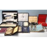 A good collection of vintage mid 20th Century silver plated cutlery sets to include fish knives,