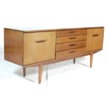 A vintage retro 1970's Jentique teak wood sideboard credenza having a central bank of four drawers