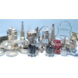 A large collection of early 20th Century silver plated items to include a silver plate flower
