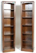 A large pair of Jaycee / Old Charm Jacobean revival oak open 5 tier bookcases. Each bookcase  having