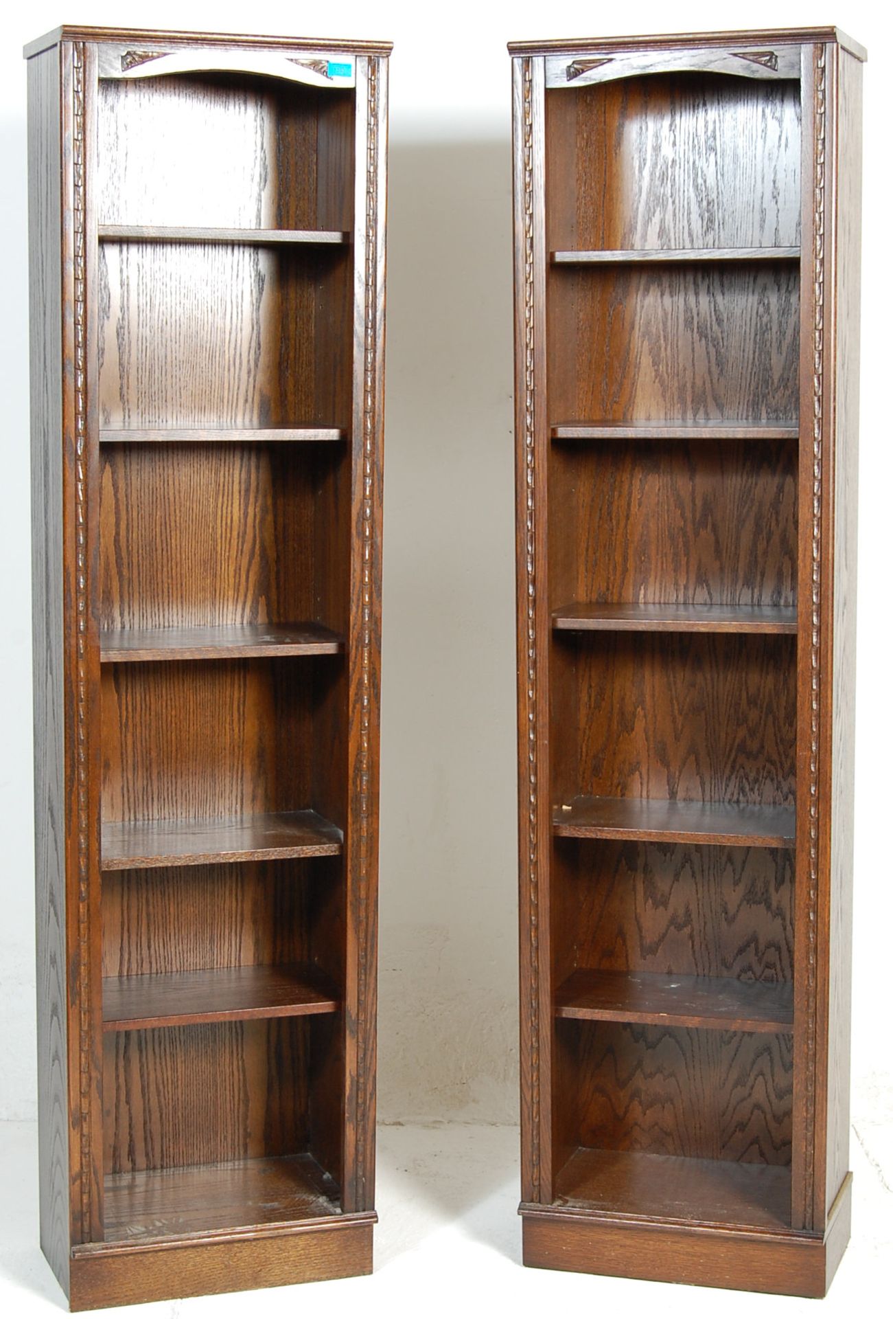 A large pair of Jaycee / Old Charm Jacobean revival oak open 5 tier bookcases. Each bookcase  having