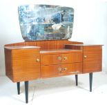 A good retro vintage 20th century teak dressing table in the manner of Mogens Kolo with drop centre,