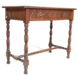 A late 19th century Victorian oak carved side writing table desk having a flared edge shaped top