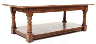 A 20th Century ' Banks of Bristol ' good quality Jacobean revival solid oak coffee table of