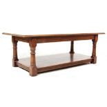 A 20th Century ' Banks of Bristol ' good quality Jacobean revival solid oak coffee table of