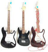 A collection of three vintage 90s electric guitars to include an Elevation Fender Stratocaster style