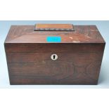 A 19th Century Victorian rosewood tea caddy of sarcophagus form with a mother of pearl escutcheon,