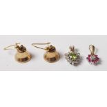 A pair of hallmarked 9ct gold earrings in the form of bells (assay marked for London), a 9ct gold
