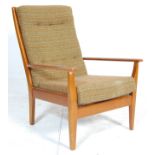 A vintage retro 20th Century Cintique teak framed lounge armchair having a brown upholstered