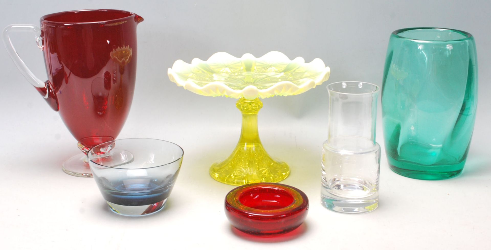 A good collection of 20th Century mixed glass to include Vaseline uranium glass tazza, Whitefriars