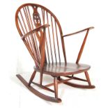 Lucian Ercolani for  Ercol Furniture. A beech and elm wood  rocking chair - armchair.  Model