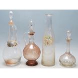 A collection of 18th century and 19th century Victorian glass decanters to include a two jug