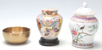A Chinese republic period lidded jar with calligraphy writing on the back and nature scene at the