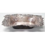A good early 20th century sterling silver dish by Theodore B. Starr with raised floral decoration to