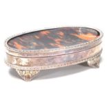 An antique 1920’s silver English hallmarked jewellery box by S Blanckensee and don Ltd Birmingham