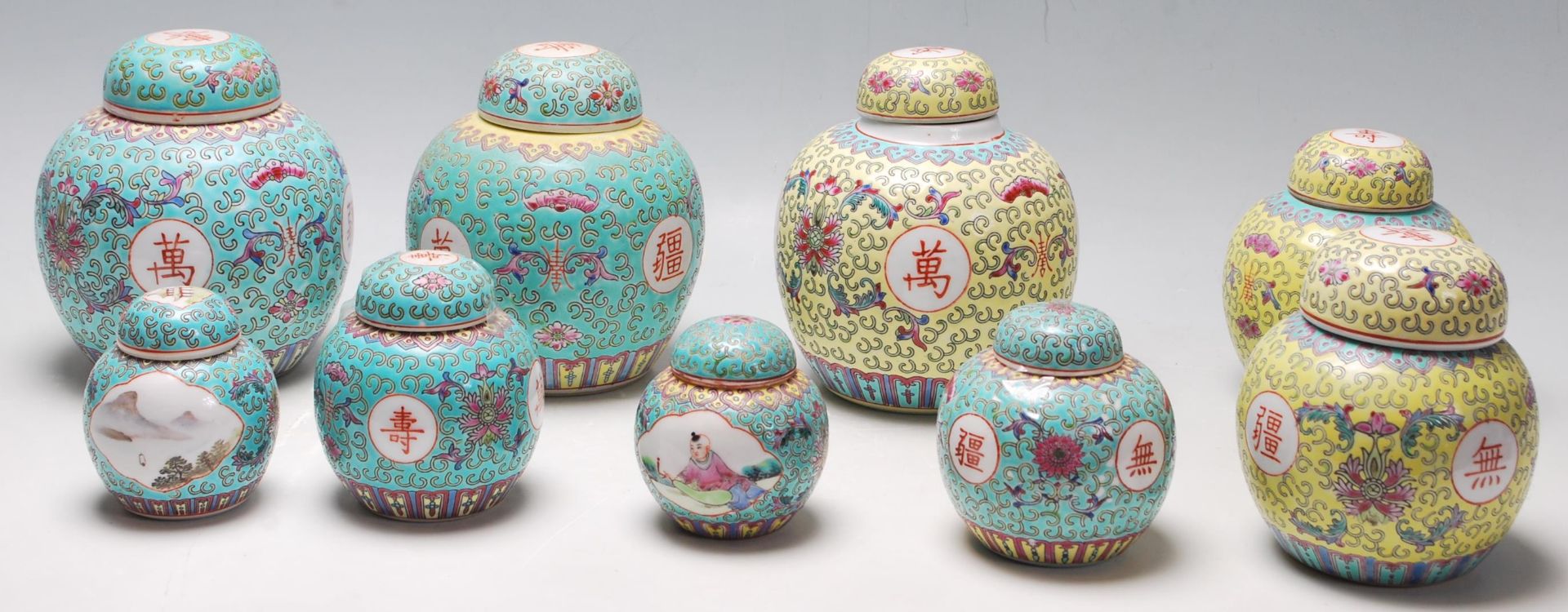 A group of 20th Century Chinese ginger jars to include six blue enamelled jars with scrolled