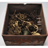 A collection of antique / vintage clock spare parts to include clock fusee movement parts, gear