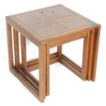 A vintage 20th Century oak nest of tables in the m