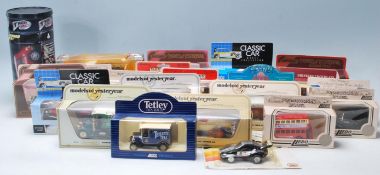 A collection of assorted scale diecast models to include a Corgi, Tyco, Matchbox, Lledo,  All models