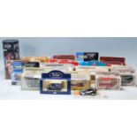 A collection of assorted scale diecast models to include a Corgi, Tyco, Matchbox, Lledo,  All models