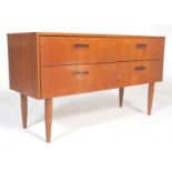A vintage retro 20th century teakwood sideboard  credenza. Having a series of four drawers with