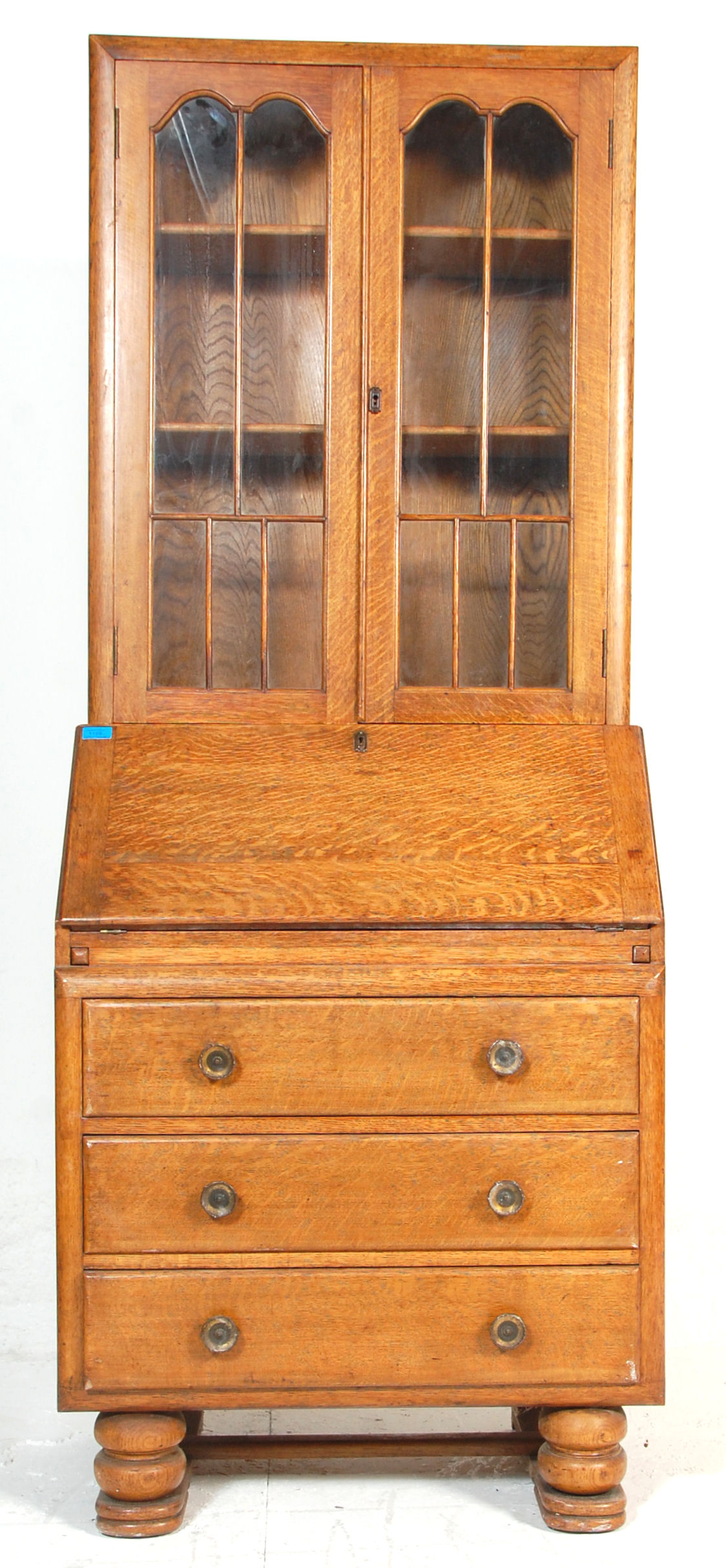 A 1930's Art Deco light oak bureau bookcase. The bookcase with a glazed double door enclosing - Image 2 of 6