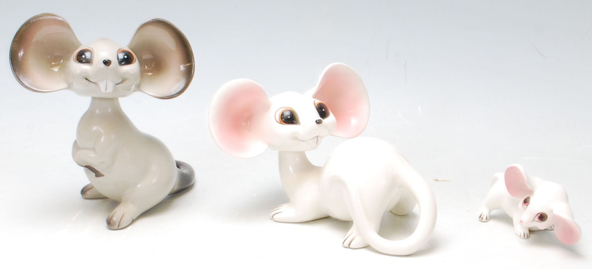 A group of 1960’s vintage German ceramic mice comprising of a pair of white and pink mice sitting on