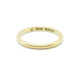 A hallmarked 22ct gold band ring of fine plain form. Hallmarked Birmingham 1938. Weight 2.6g. Size