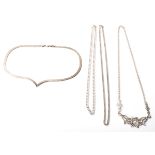 A selection of silver necklaces to include a flat linked pointed necklace chain (stamped 925), a