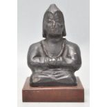 An usual Eastern clay / terracotta figure of Buddh