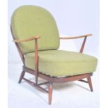 Lucian Ercolani for Ercol Furniture. A mid 20th Century Ercol Windsor armchair, easy chair with a