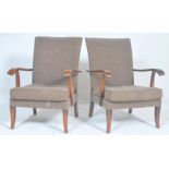 Parker Knoll - A pair of mid century Parker Knoll P.K. 717 vintage open framed armchairs / easy