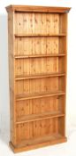 A large 20th century country pine contemporary tall open window bookcase cabinet with shelving