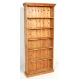 A large 20th century country pine contemporary tall open window bookcase cabinet with shelving