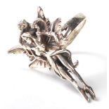 A stamped .925 silver ladies dress ring in the form of a winged fairy. Weighs 7.7g. Size P.