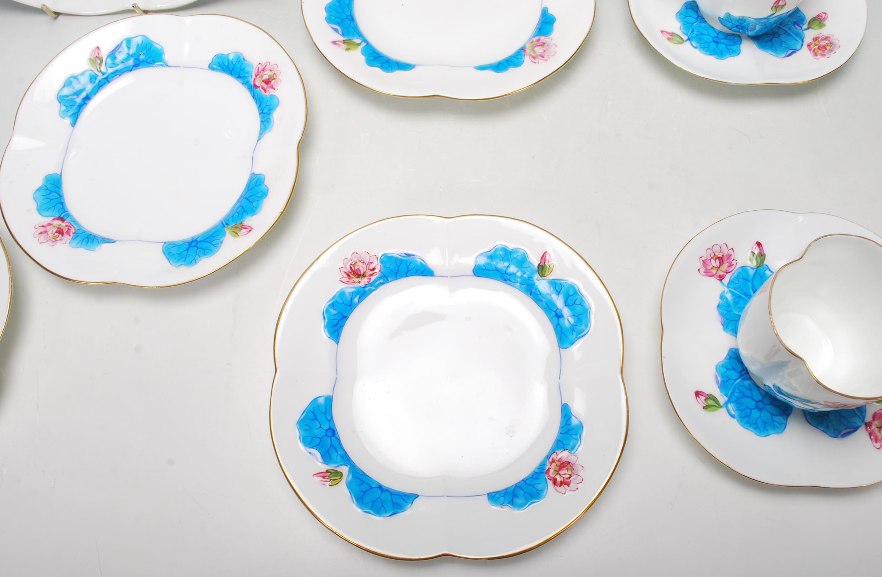 A 19th Century Victorian Coalport china tea set comprising of four trios and one cake plate with - Image 3 of 7