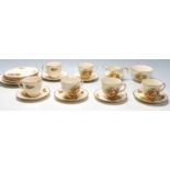 An early 20th century Alfred Meakin English tea service to include six cups, six saucers plates, a