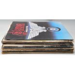 A collection of vinyl long play LP record albums to include The Continuing Saga of the Ageing