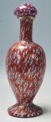 A 20th Century Italian Venetian Murano glass millefiori stoppered bottle vase having a red ground