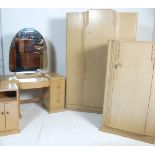 An Art Deco 1930's  retro vintage limed oak bedroom suite in the manner of Heals. The suite