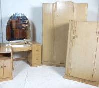 An Art Deco 1930's  retro vintage limed oak bedroom suite in the manner of Heals. The suite