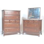 A vintage mid century Stag minstrel mahogany bedroom suite. Comprising the dressing table having a