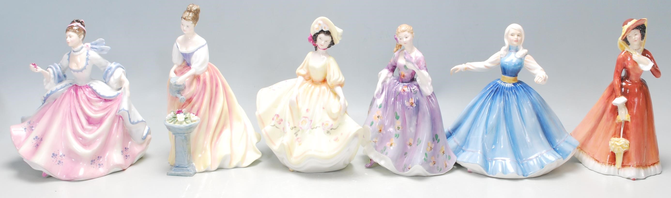 A group of six Royal Doulton porcelain figurines to include Rebecca HN2805, Julia HN2705, Sunday