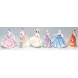 A group of six Royal Doulton porcelain figurines to include Rebecca HN2805, Julia HN2705, Sunday