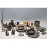 A good collection of assorted  brass, copper, pewter items to include cast metal table lighter,