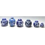 A group of 20th Century hand painted Chinese blue and white ginger jars of bulbous form al being